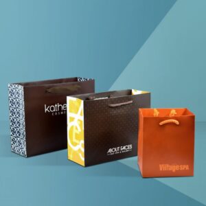unique shopping bags, paper shopping bags, plastic shopping bags, reusable shopping bags, custom handles, custom materials, custom treatments, custom embellishments, cub, vogue, custom sizing, shopping bag sizes, biodegradable plastic, post-consumer waste, specialty papers, reusable materials