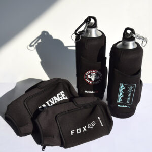 Buckle, water bottle holders, insulated coolers, insulated cooler bags, towels, promotional items, marketing items, gift with purchase, gift with purchase items, drawstring backpacks, gift with purchase packaging, promotional retail packaging